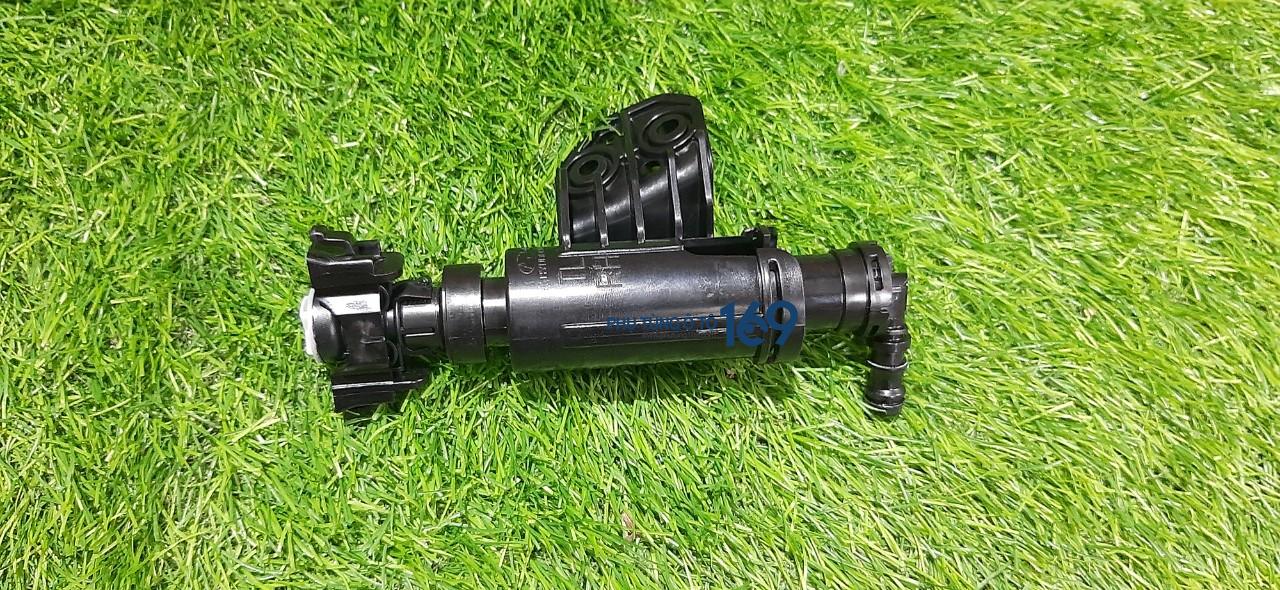 Vòi phun nước rửa đèn pha Tucson Vòi phun nước rửa đèn pha Tucson