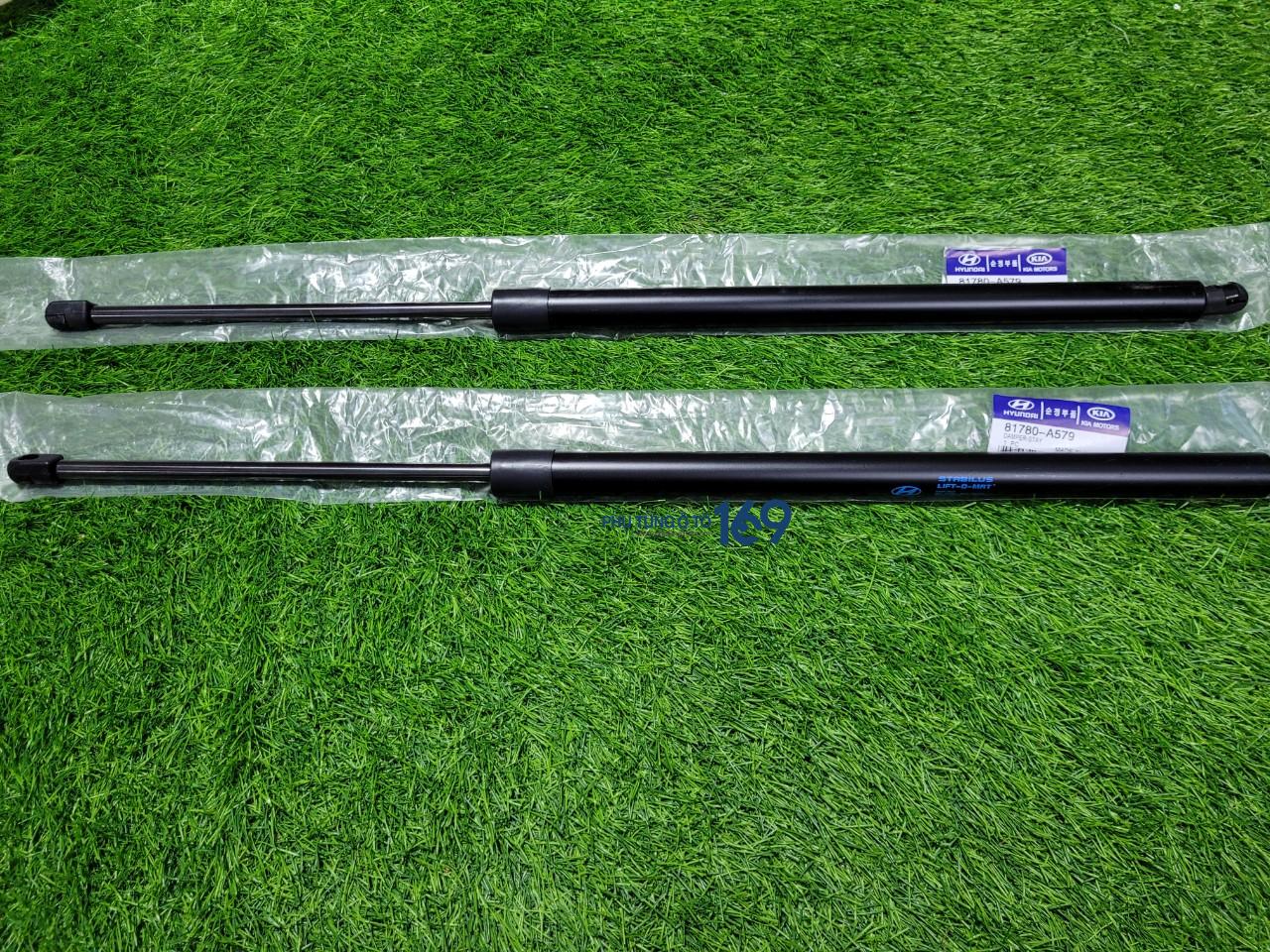 Ty chống cốp hậu Carnival Ty chống cốp hậu Carnival