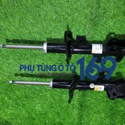 Phuộc nhún trước phụ Livina