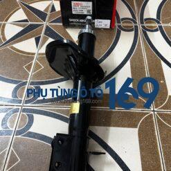 Phuộc nhún sau Mazda 626