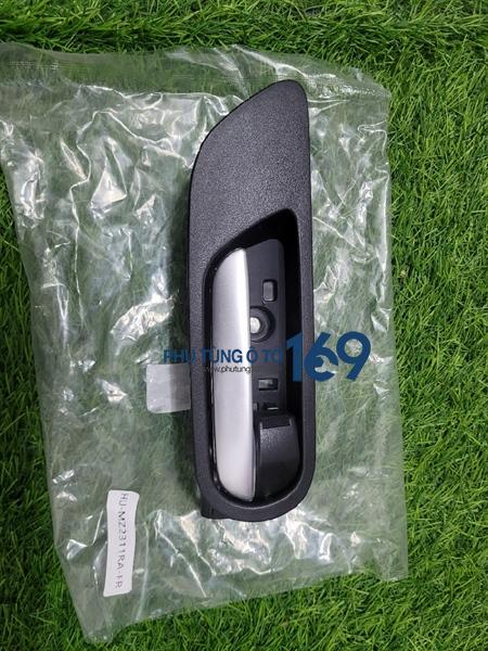 Tay mở trong trái Mazda 3 Tay mở trong trái Mazda 3