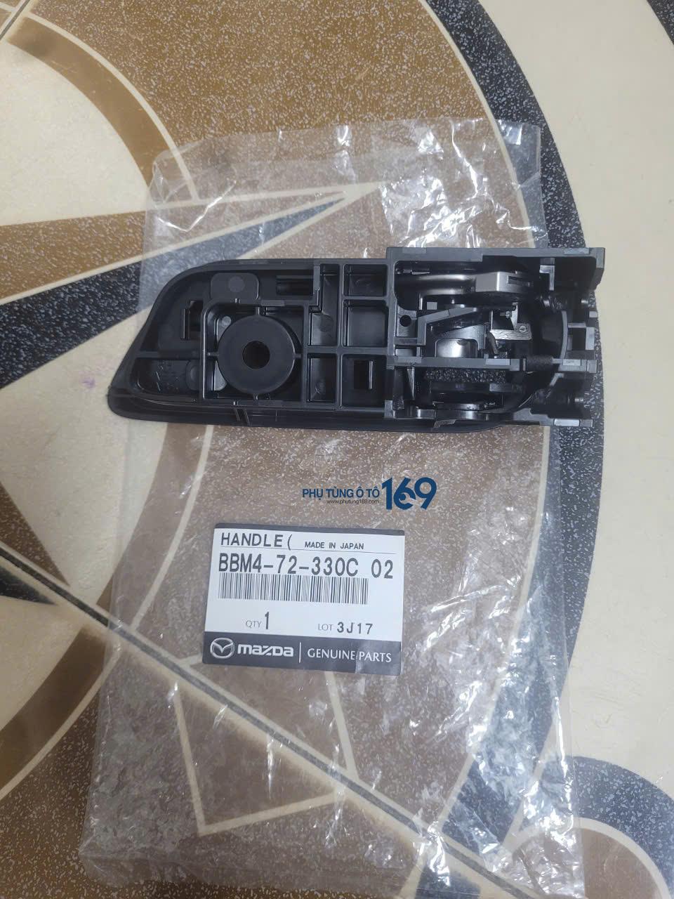 Tay mở cửa trong Mazda3a