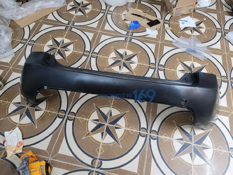 Ba đờ xốc sau Kia Carens